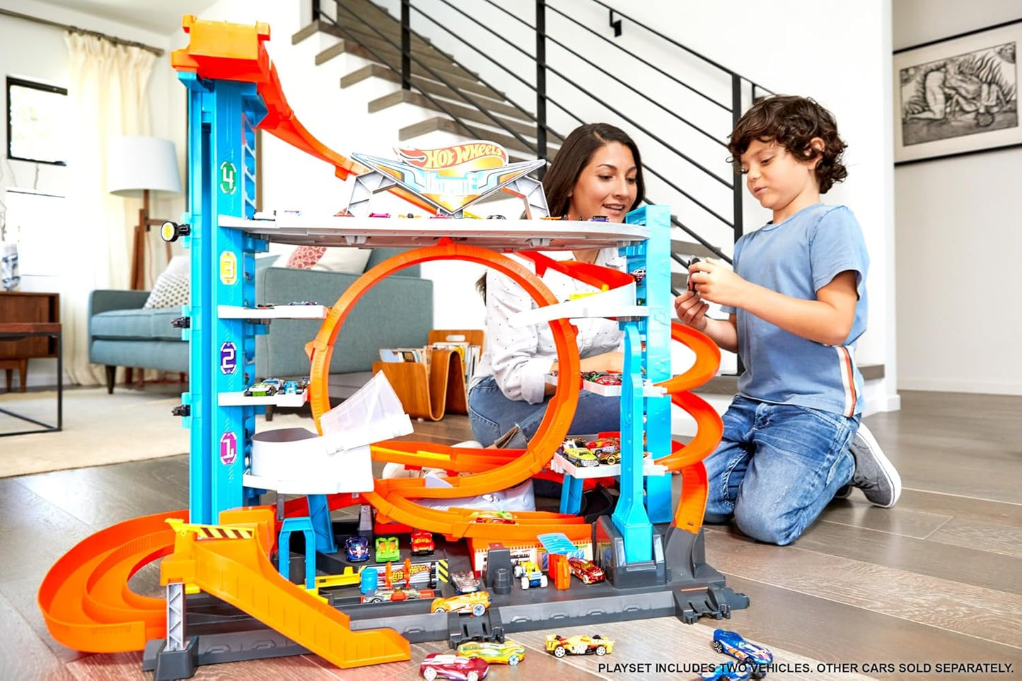 Hot Wheels – Hai Parkgarage | inkl. 2 Spielzeugautos | Autorennbahn mit Loopings, Aufzug & Platz für über 90 Autos | Höhe: 63 cm | Ab 5 Jahren – Wie neu