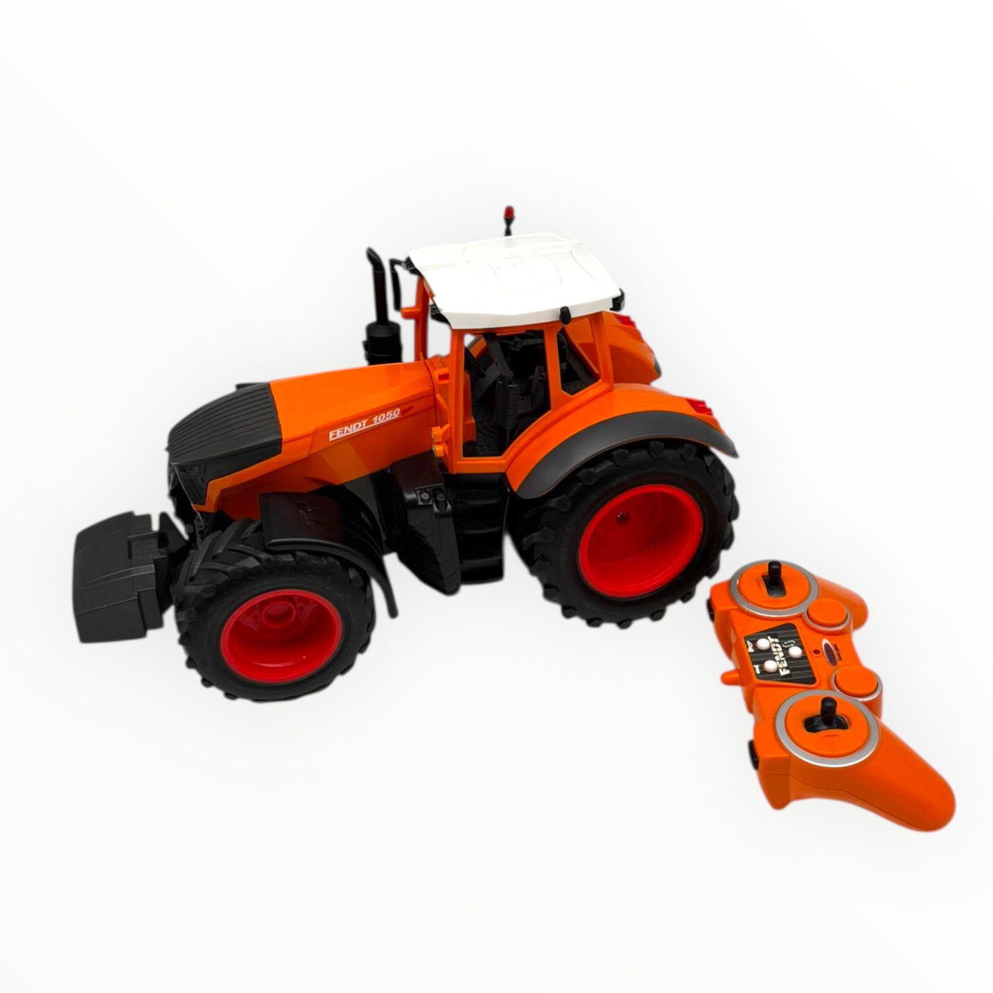 Orange JAMARA Fendt 1050 Vario Kommunal RC tractor model in 1:16 scale with detailed features and realistic design.