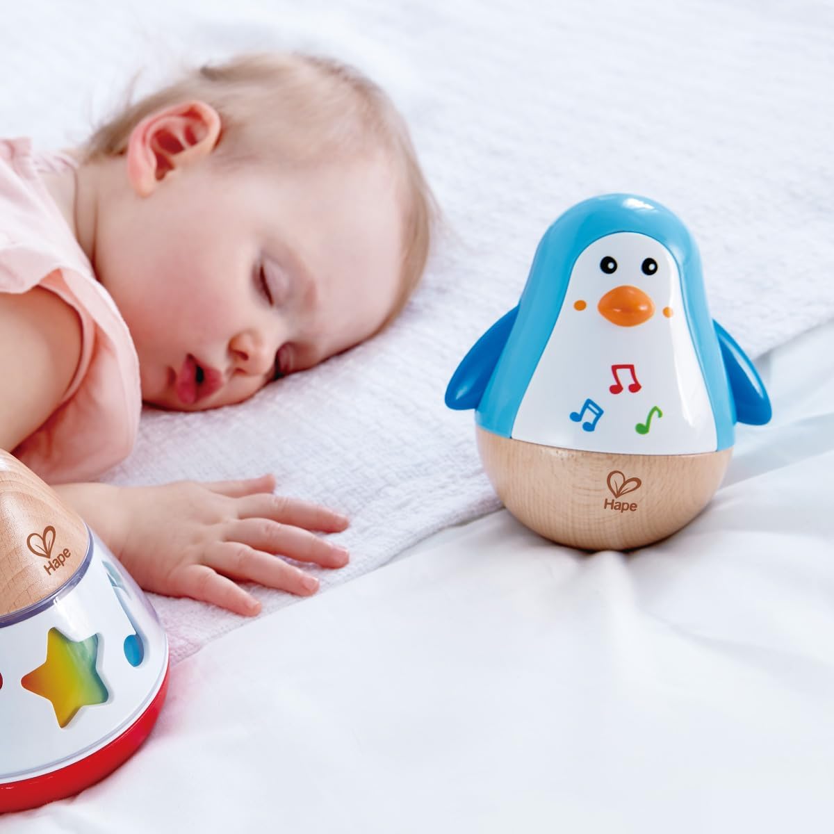 Hape Stehauf - Pinguin – Motorikspielzeug aus Holz (blau)