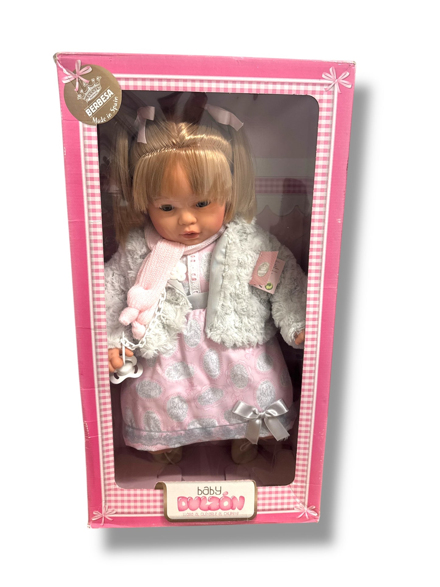 Muñecas Berbesa Baby Dulzón, a soft, cuddly baby doll by Spielzeug & Spielwaren, dressed in a cute outfit.