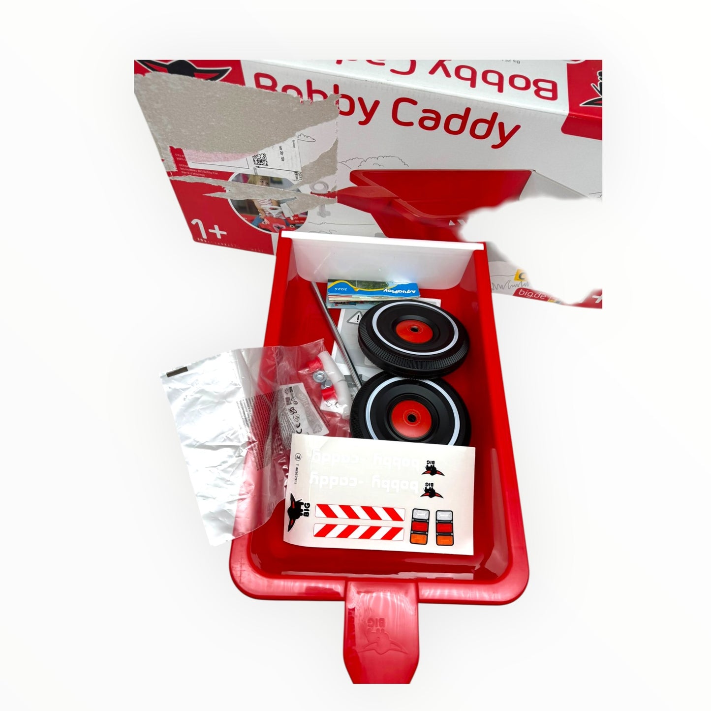 BIG Bobby Caddy Anhänger in red, practical add-on trailer for BIG Bobby-Car, showcasing its design and functionality.