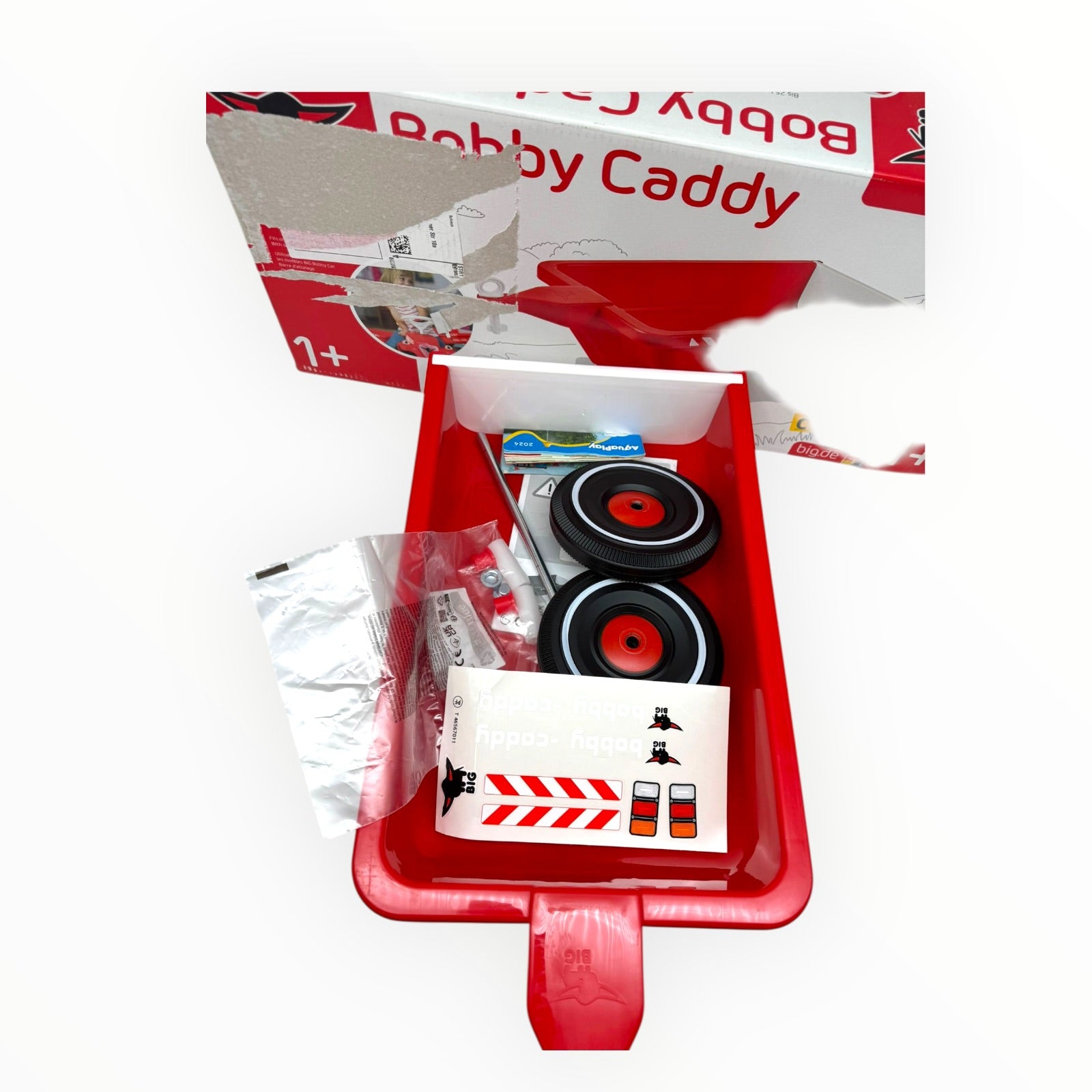 BIG Bobby Caddy Anhänger in red, practical add-on trailer for BIG Bobby-Car, showcasing its design and functionality.