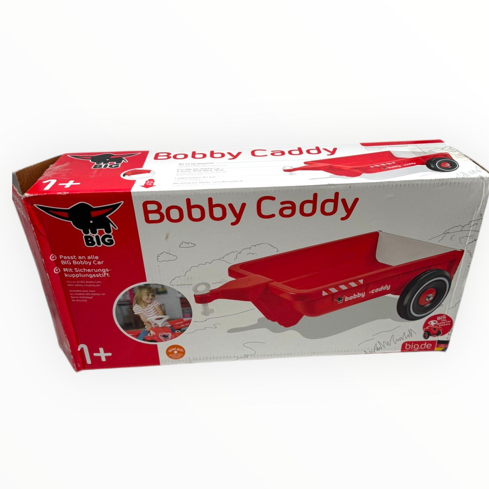 Red BIG Bobby Caddy trailer for BIG Bobby Car, featuring a practical design for added storage and play.